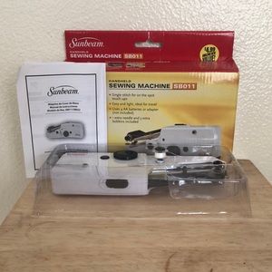 Handheld sewing machine